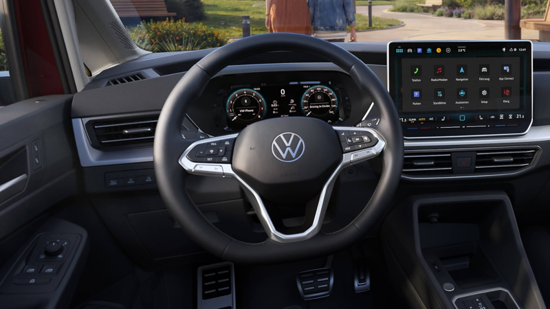 close up of the leather multifunction steering wheel in the Caddy