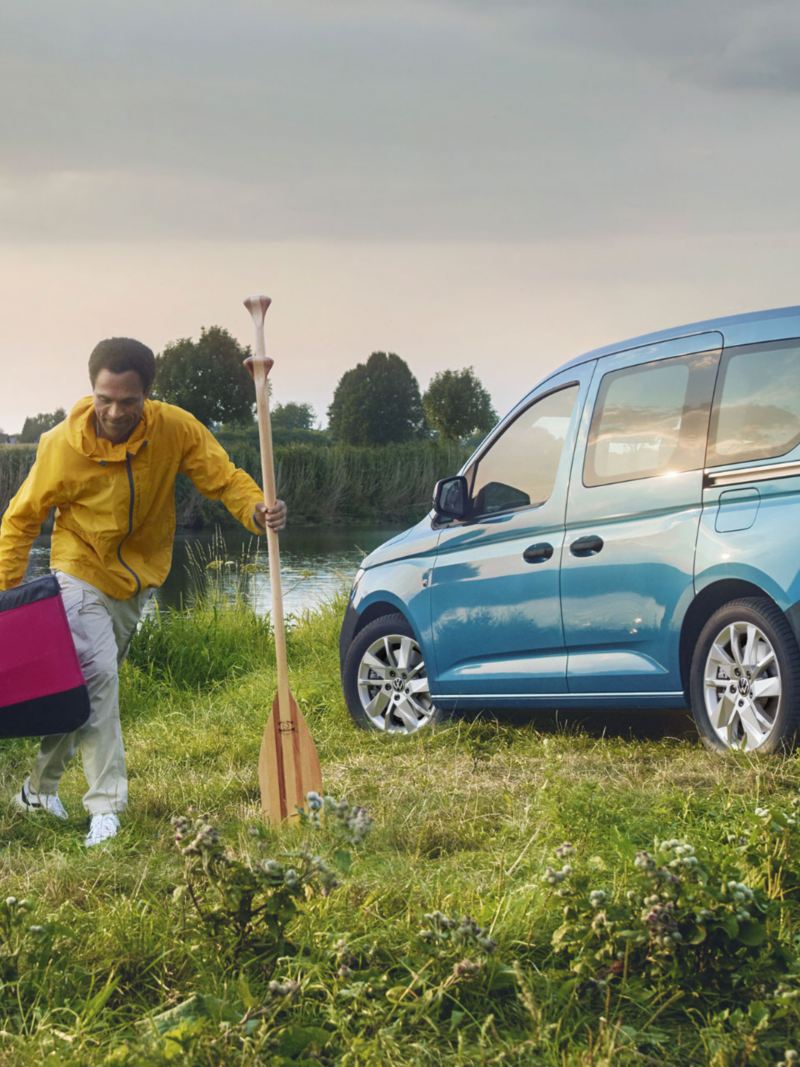 new volkswagen caddy kombi by the riverbank