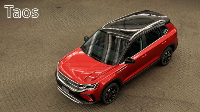 SUV 2022 - Taos de Volkswagen en color rojo con techo en color negro. 