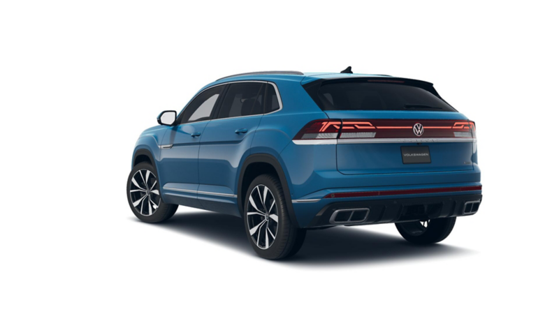 Cross Sport Volkswagen. SUV de lujo de color azul. Vista a puerta de cajuela, faros traseros y llantas.