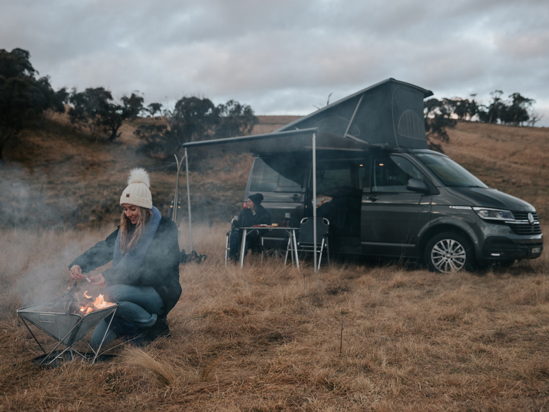 Couples camping with the Volkswagen Van.
