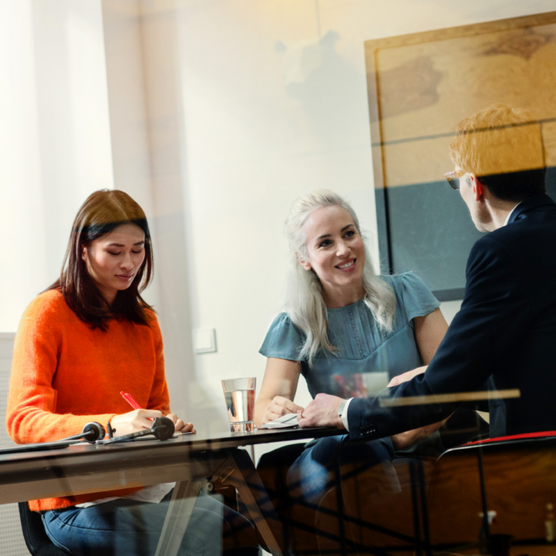 People sitting around the table working