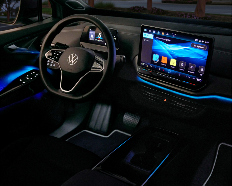 Interior of VW showing connectivity software on infotainment system.