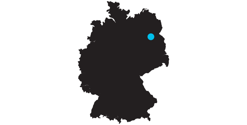 Outline of a map of Germany with a mark on the location of Berlin