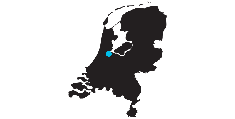 Zarys mapy Holandii z zaznaczonym Amsterdamem