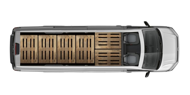 Volkswagen Crafter Furgone a passo lungo con sbalzo lungo visto dall’alto. Il tetto manca e il vano di carico risulta immediatamente visibile. All’interno sono posizionati sei euro-pallet l’uno accanto all’altro.