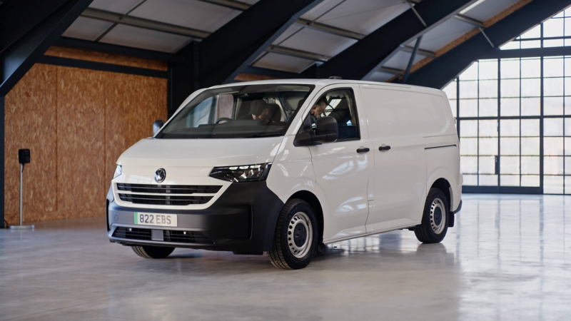 a white e-transporter parked in a warehouse