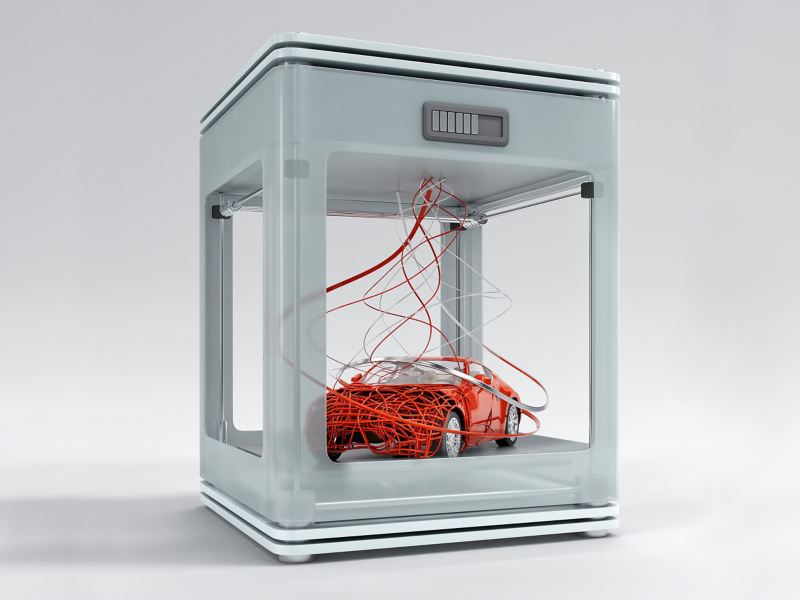 Ein Auto entsteht in einem 3D-Drucker.