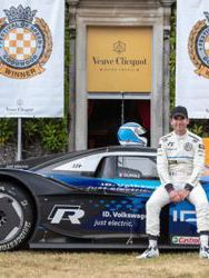 Racing driver Romain Dumas and the Volkswagen ID.R at the 2019 Goodwood Festival of Speed