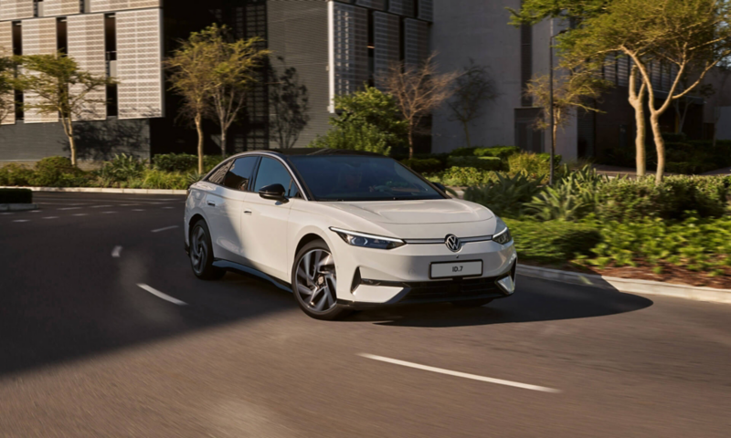 VW ID.7 driving on a road, diagonal view from the front