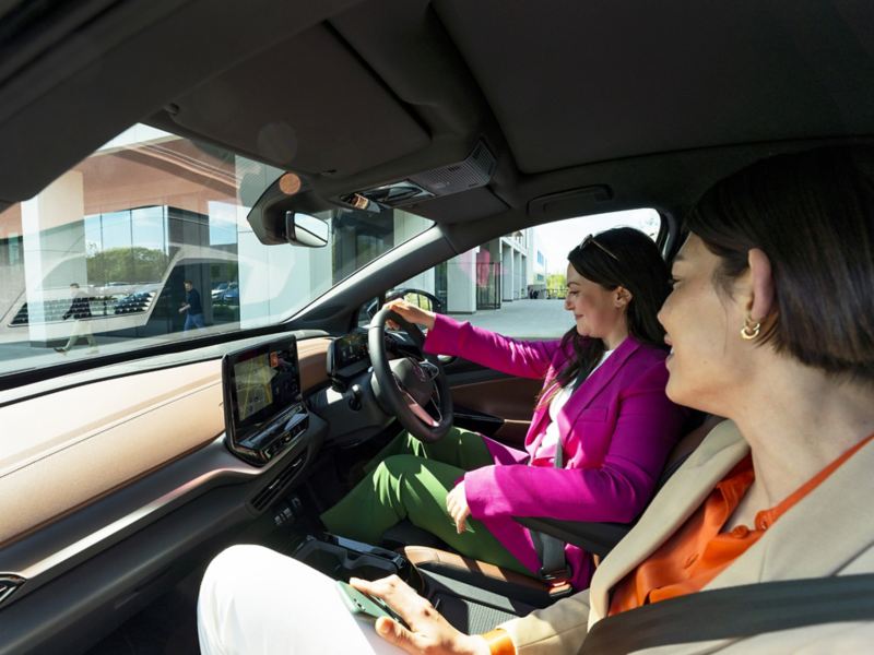 Two women in a Volkswagen ID.5 car