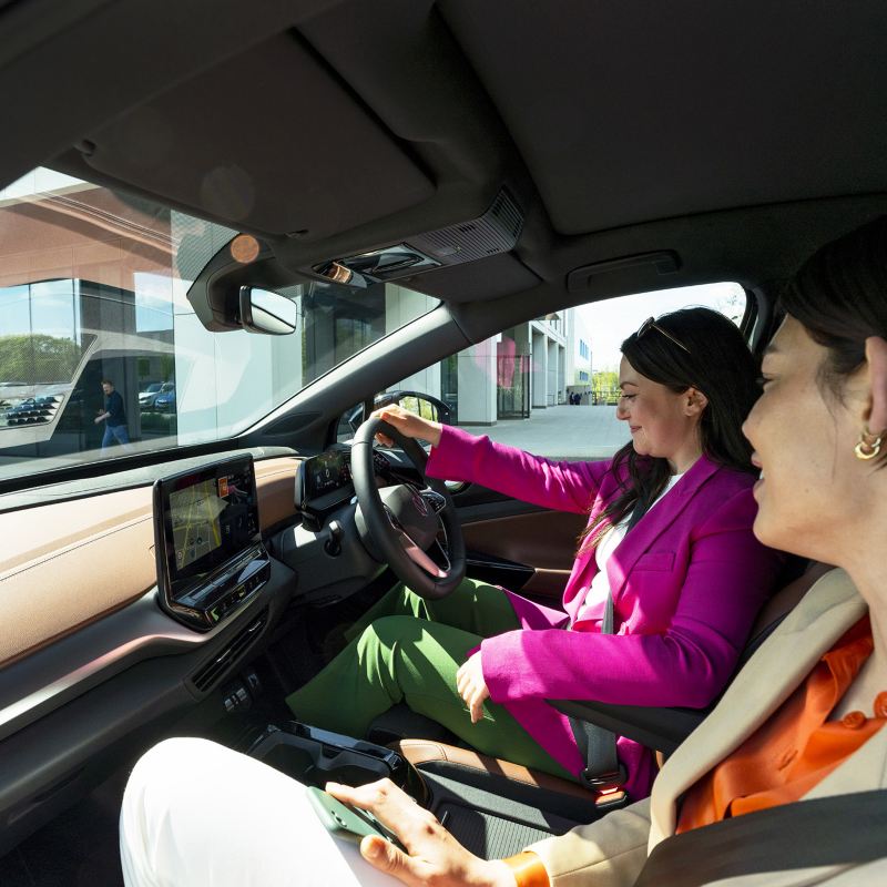 Two women in a Volkswagen ID.5 car