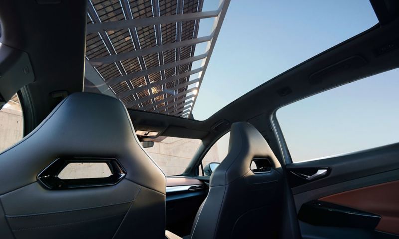 Interior shot of VW ID.5 focussed on tilting panoramic sunroof