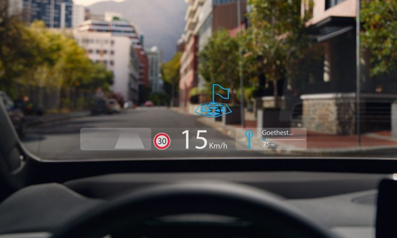 The view of a VW ID with the augmented reality head-up display on the windscreen as seen from inside the vehicle.
