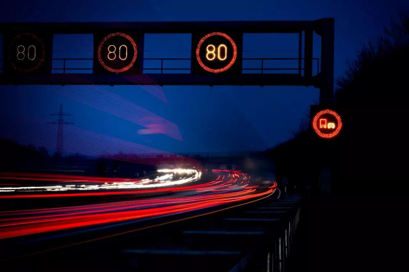 Motor way at night with speed limits
