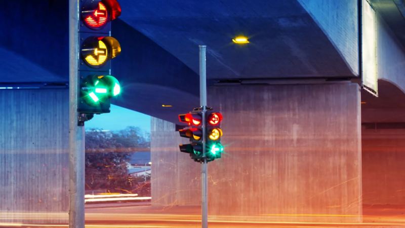 Traffic lights under a bridge