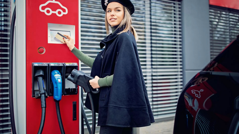 Woman at charging station