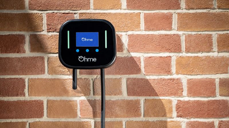 Ohme wallbox pod connected to a wall.