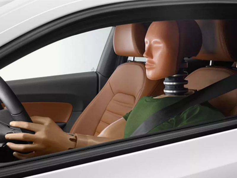 Crash test dummy sitting in a VW car