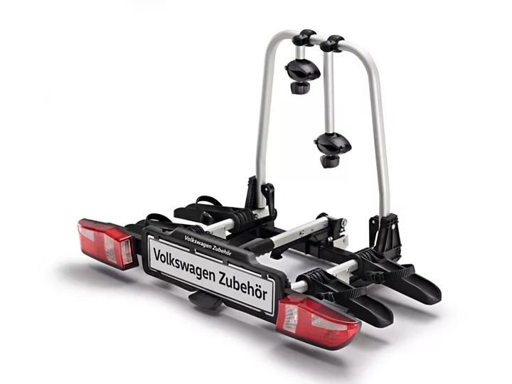Volkswagen Zubehör tow bar bicycle carrier with integrated taillights and a license plate holder on a white background.