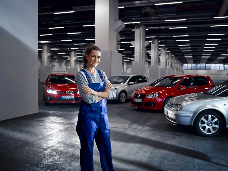 Woman standing in VW garage