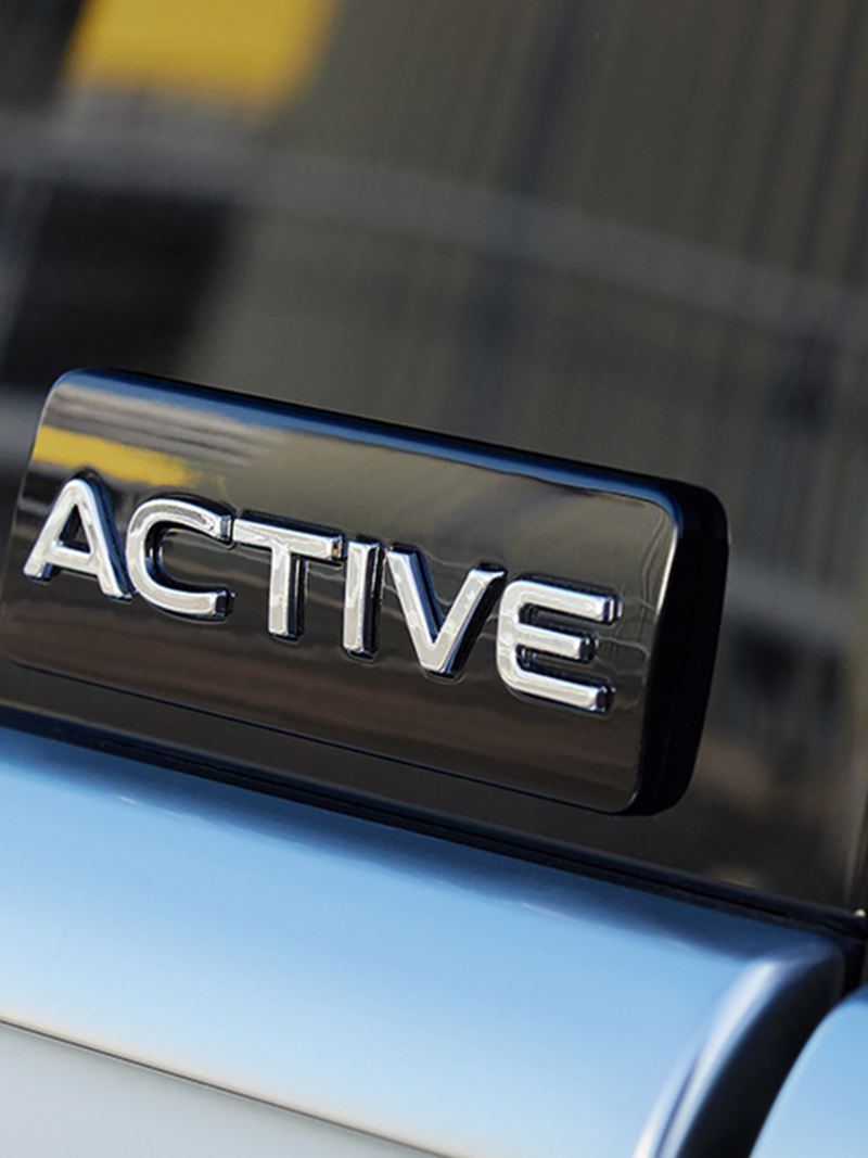 VW ACTIVE special edition model badge on the door of a white VW Sharan ACTIVE.