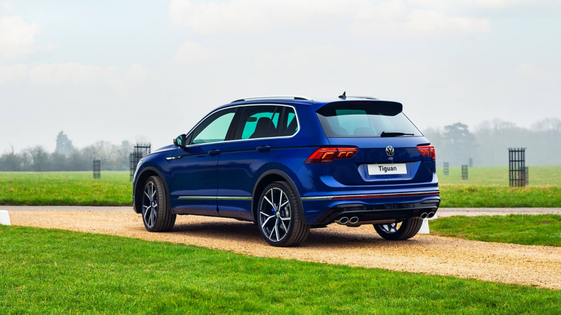 A Tiguan R parked by a field