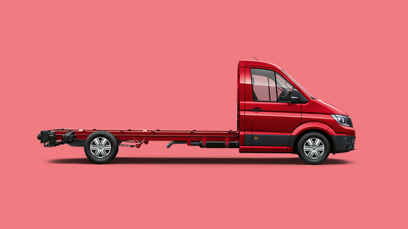 A VW Crafter Chassis Cab against a plain red background. 