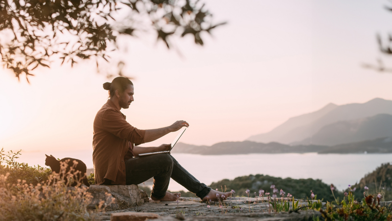 Working on a laptop in the great outdoors.