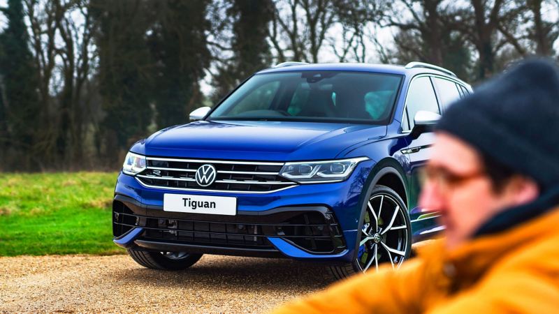 Exterior of a blue Volkswagen Tiguan R parked on a dirt road