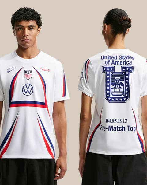 USA Soccer pre-match top, featuring a white design with red and blue accents, Volkswagen logo.