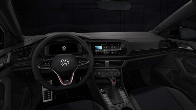 Interior de GLI 40 aniversario, con panel central y volante multifunciones. 