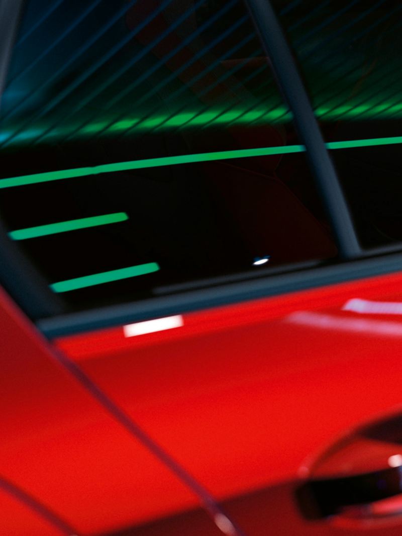 Closeup of the back door of the Golf GTI in red