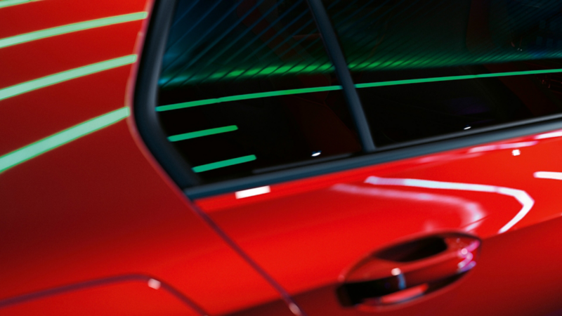 Closeup of the back door of the Golf GTI in red