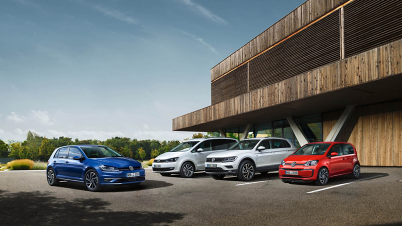 A selection of four Volkswagen cars parked