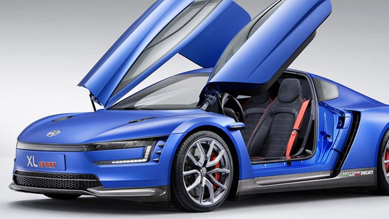  A parked XL1 Sport concept car with its wing doors open