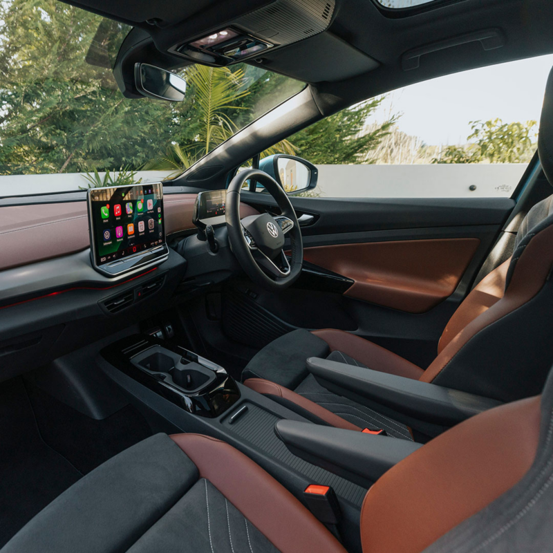 Front on image of ID. 4 pro driving through field