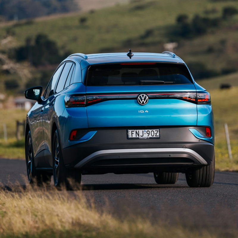 Image of ID 4 Pro driving through farmland terrain at sunset