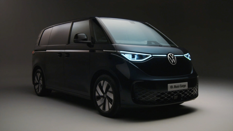 a 3/4 image of a black ID. Buzz Cargo with its headlights on