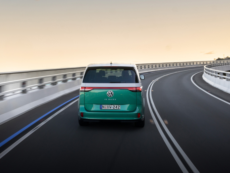 ID Buzz rear view driving on road
