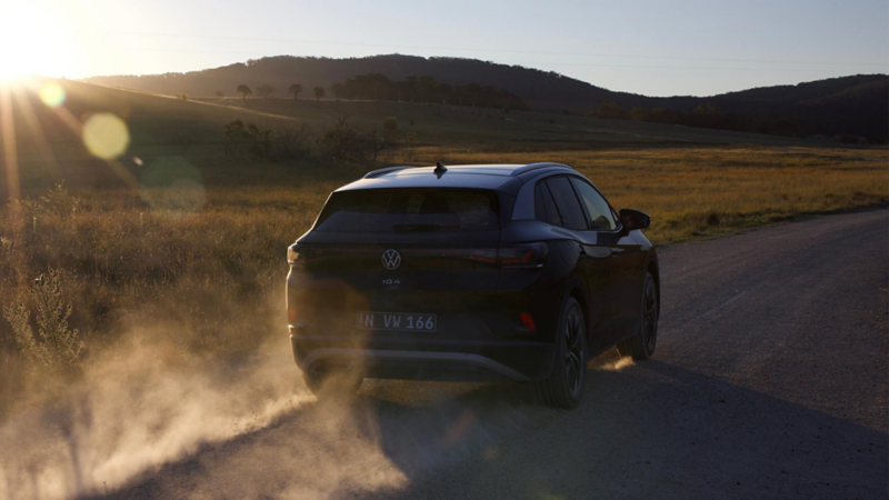 ID car driving off at sunset