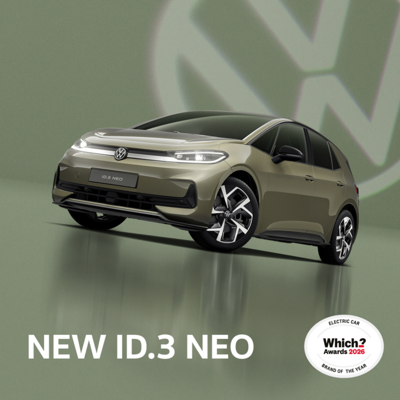 A front three-quarter view of a brown ID.3 Neo set on a brown background with a transparent Volkswagen logo