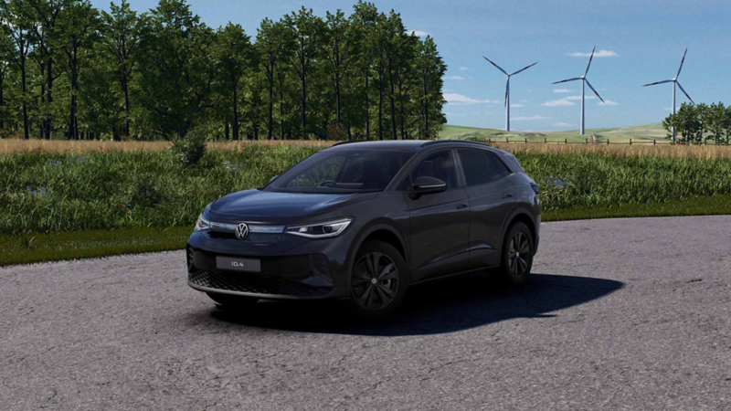 a navy blue ID.4 Black Edition parked in the countryside