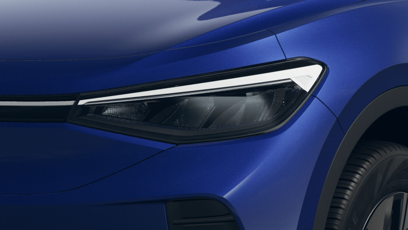 a close up of the headlights on a blu ID.4