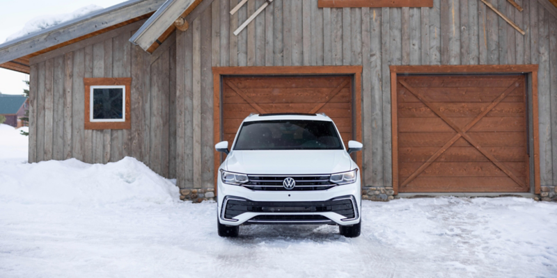 VW Tiguan parked in driveway.