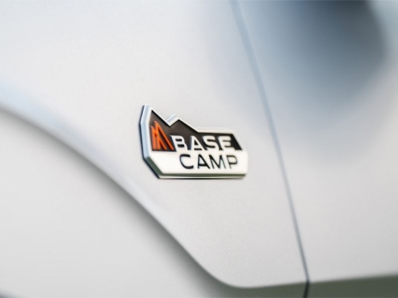 Base camp emblem on side of VW Atlas.