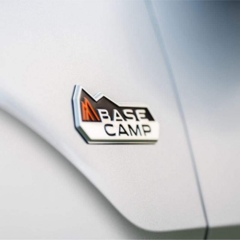 Base camp emblem on side of VW Atlas.