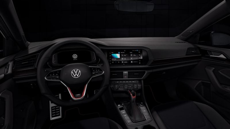 Interior de Jetta GLI 40 aniversario, con volante multifunciones y pantalla touch.