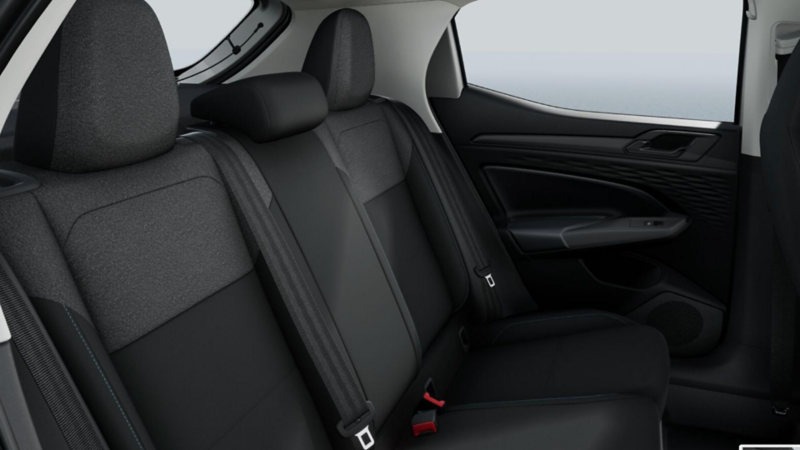 Asientos traseros de tela en interior de VW Tera para 5 pasajeros.