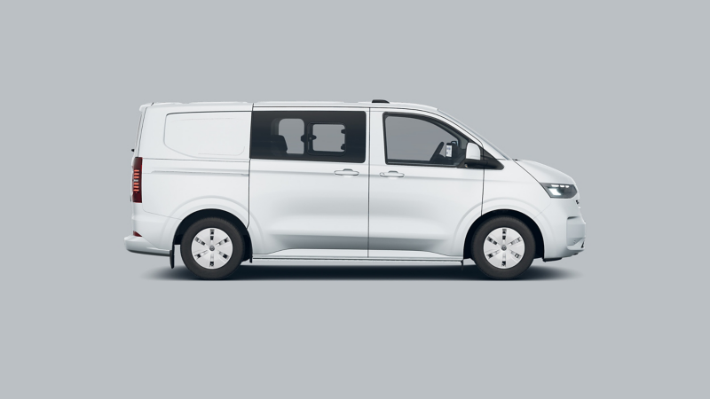 A VW Transporter Kombi against a plain grey background. 